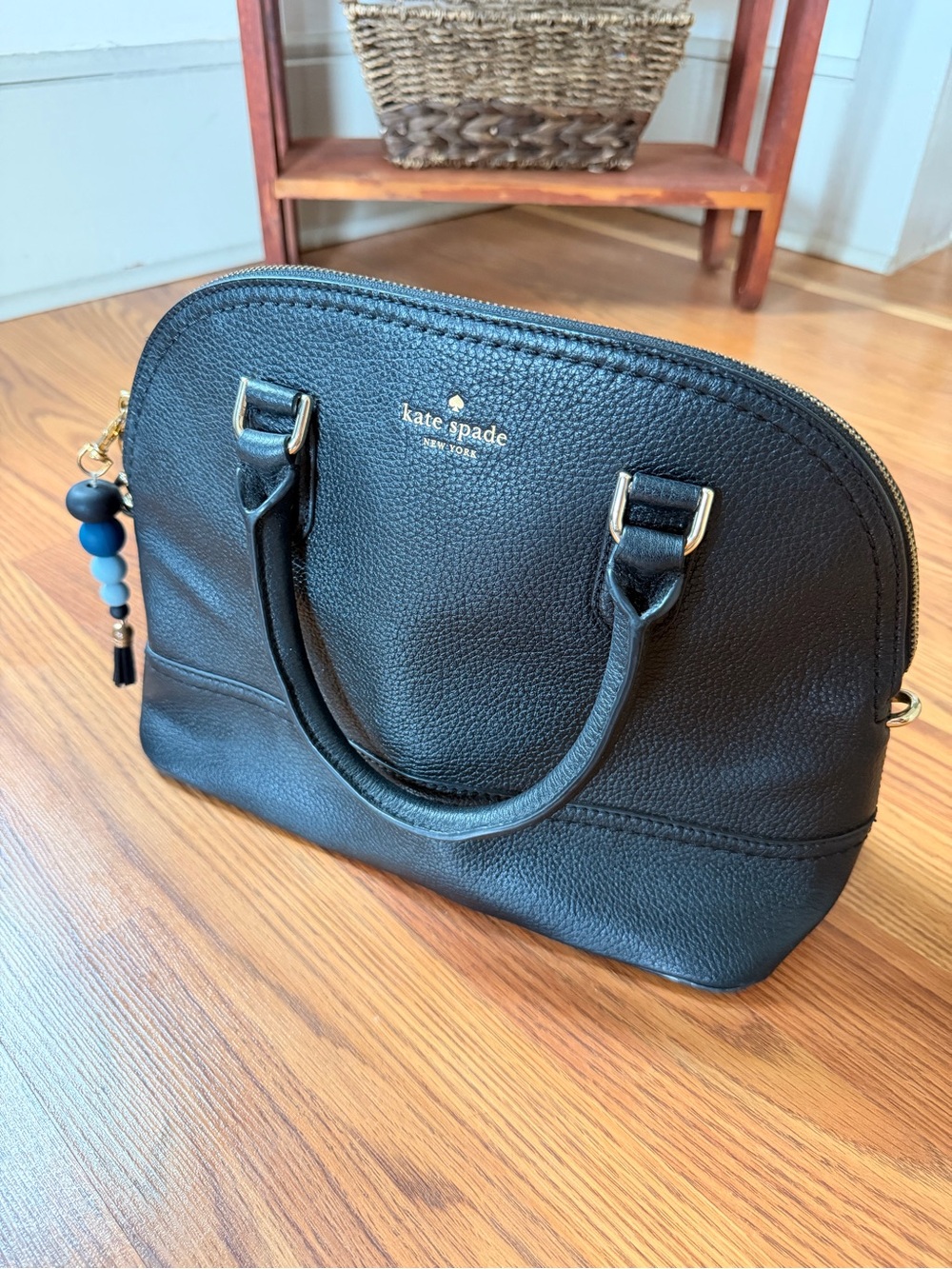 kate spade black pebbled leather dome satchel with gold-tone accents